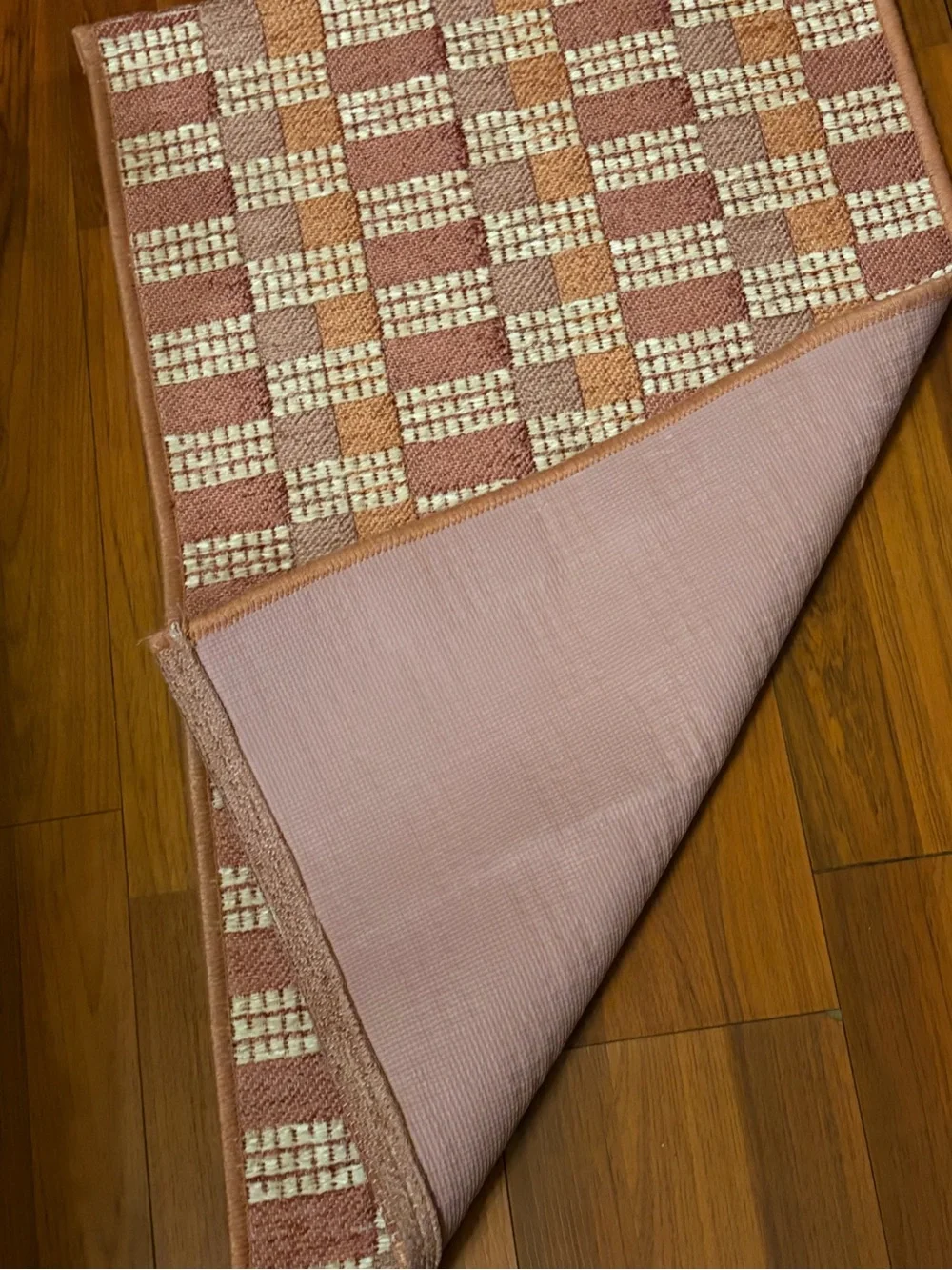 Woven Checkerboard Accent Rug in Rose and Cream